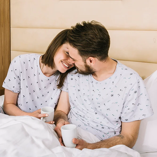 young-couple-bed-morning